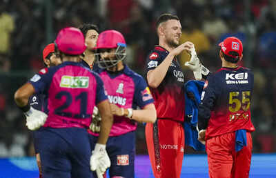 Bengaluru Royal Challengers Bengalurus Josh Hazlewood with teammate celebrates