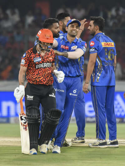 Hyderabad Mumbai Indians players celebrate the wicket of Sunrisers Hyderabads
