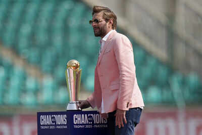 Pakistans former cricketer Shahid Afridi displays the trophy before start of th