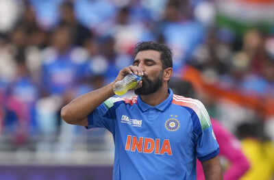 dubai india39s bowler mohammed shami after suffering an injury on his hand durin